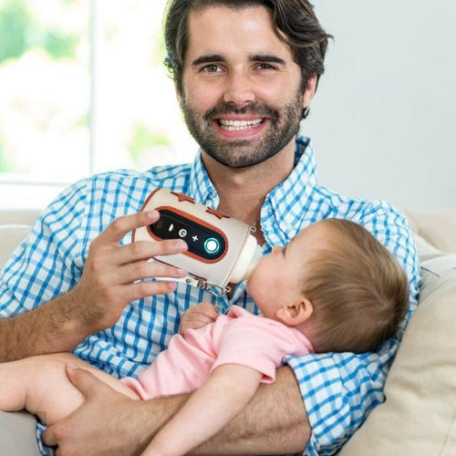 Chauffe biberon Chanelle avec papa