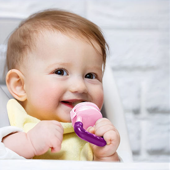 Grignoteuse bébé alimentaire rose pùle