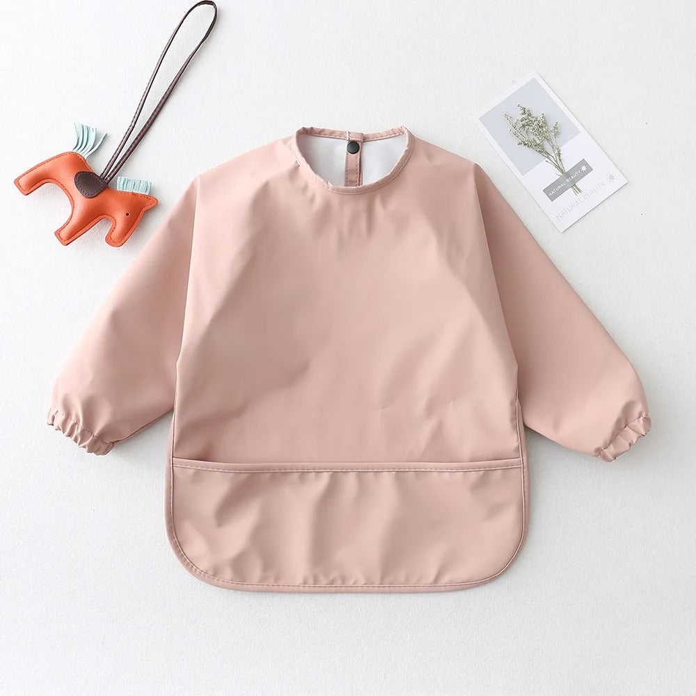 Bavoir a manche longue pochette rose