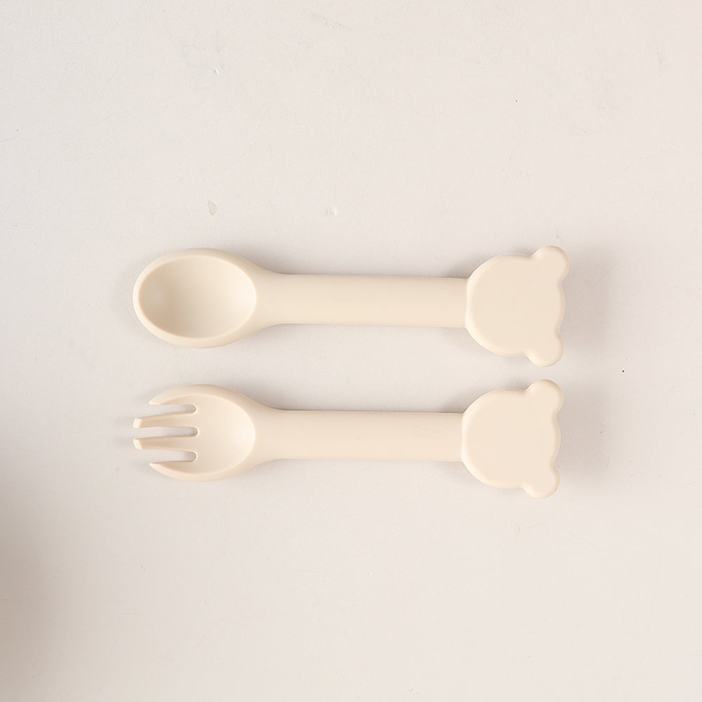 Cuillère ergonomique bébé tête ousron ivoire