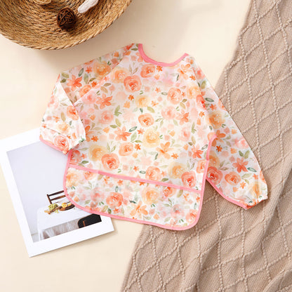 Bavoir bébé imperméable Nicholas fleurs rose
