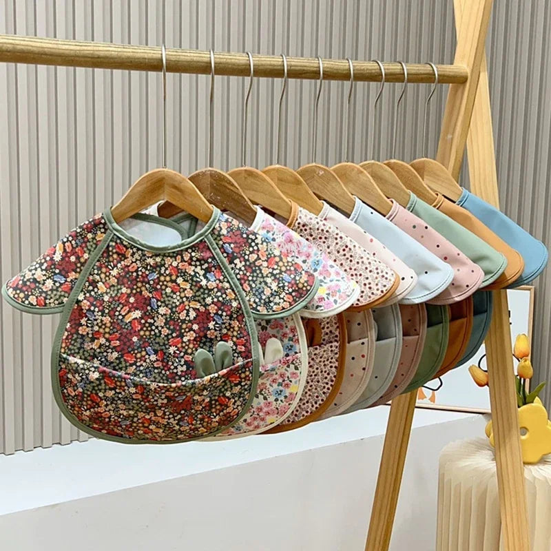 Bavoir bébé imperméable empreint animaux rouge