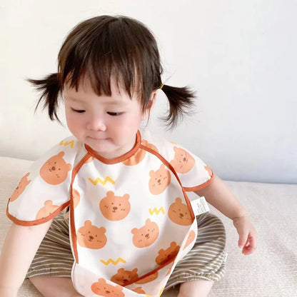 Bavoir imperméable dessin anime brun