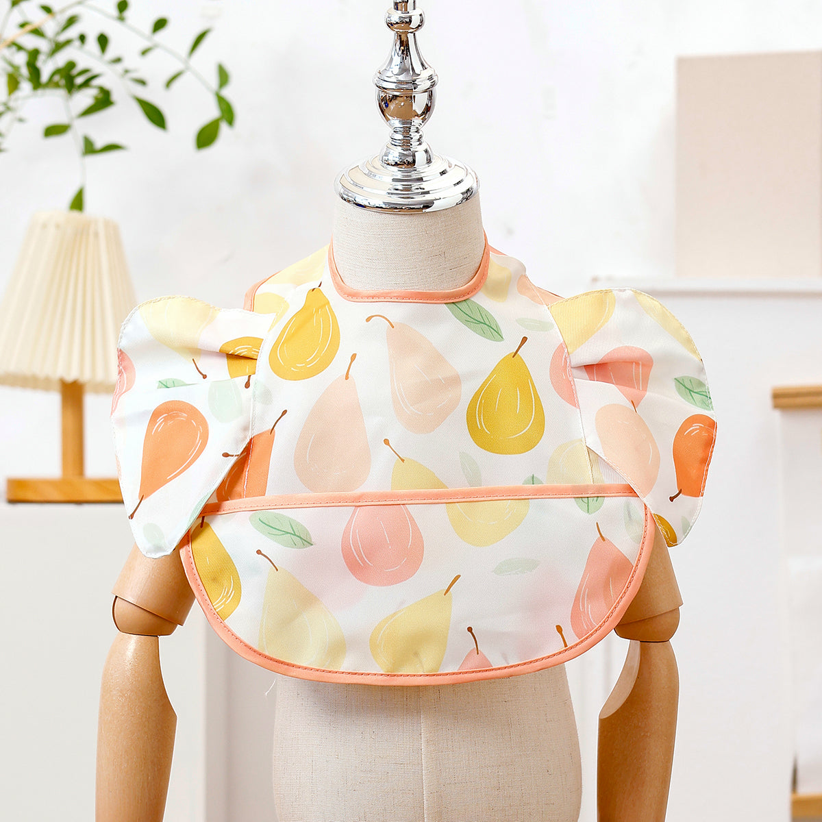 Bavoir bébé imperméable avec poche couleur orange