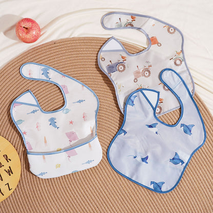 Bavoir bébé imperméable avec poche de-récupération bleu