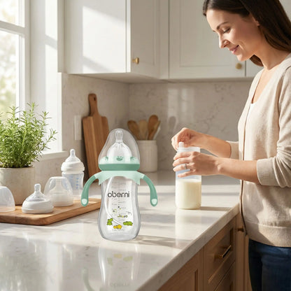 Biberon anti colique breveté avec pattes vert
