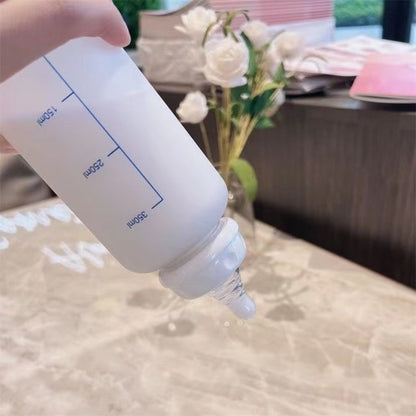 Biberon reconfortant ousron avec mesure