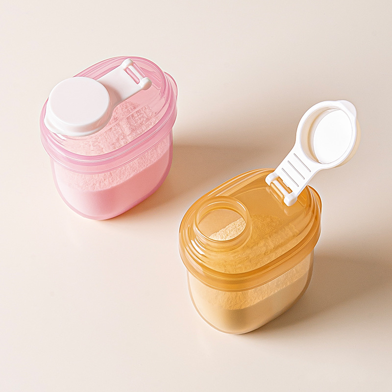Boite doseuse lait bébé deux couleurs
