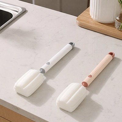 Goupillon biberon hygiène parfaite blanc et rose 