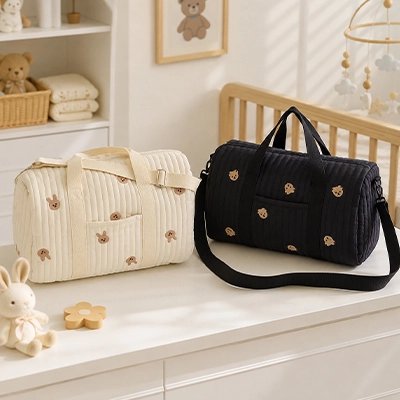 Sac à dos à langer bébé pratique et stylé deux différentes couleurs