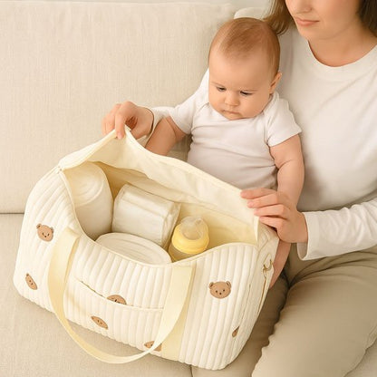 Sac à langer bébé avec bébé et biberon