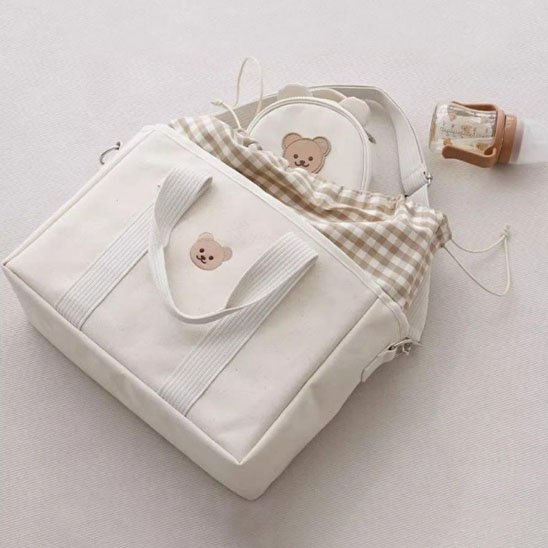 Sac à langer blanc avec petit sac blanc