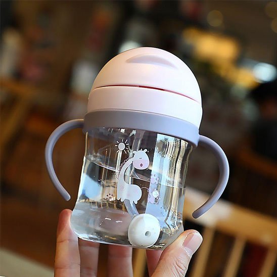 Tasse d'apprentissage avec manche