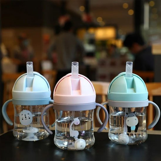 Tasse d'apprentissage avec vache