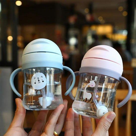 Tasse d'apprentissage rose