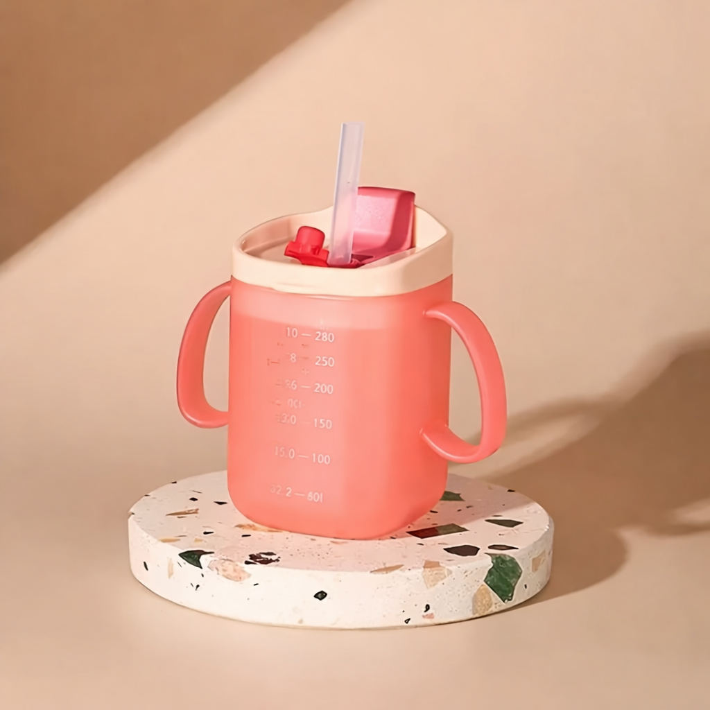 Tasse pour bébé évolutive rose