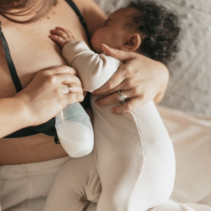 tire lait maternel bébé endormi
