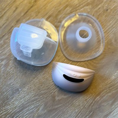 Tire lait portable discret silencieux rose mauve 